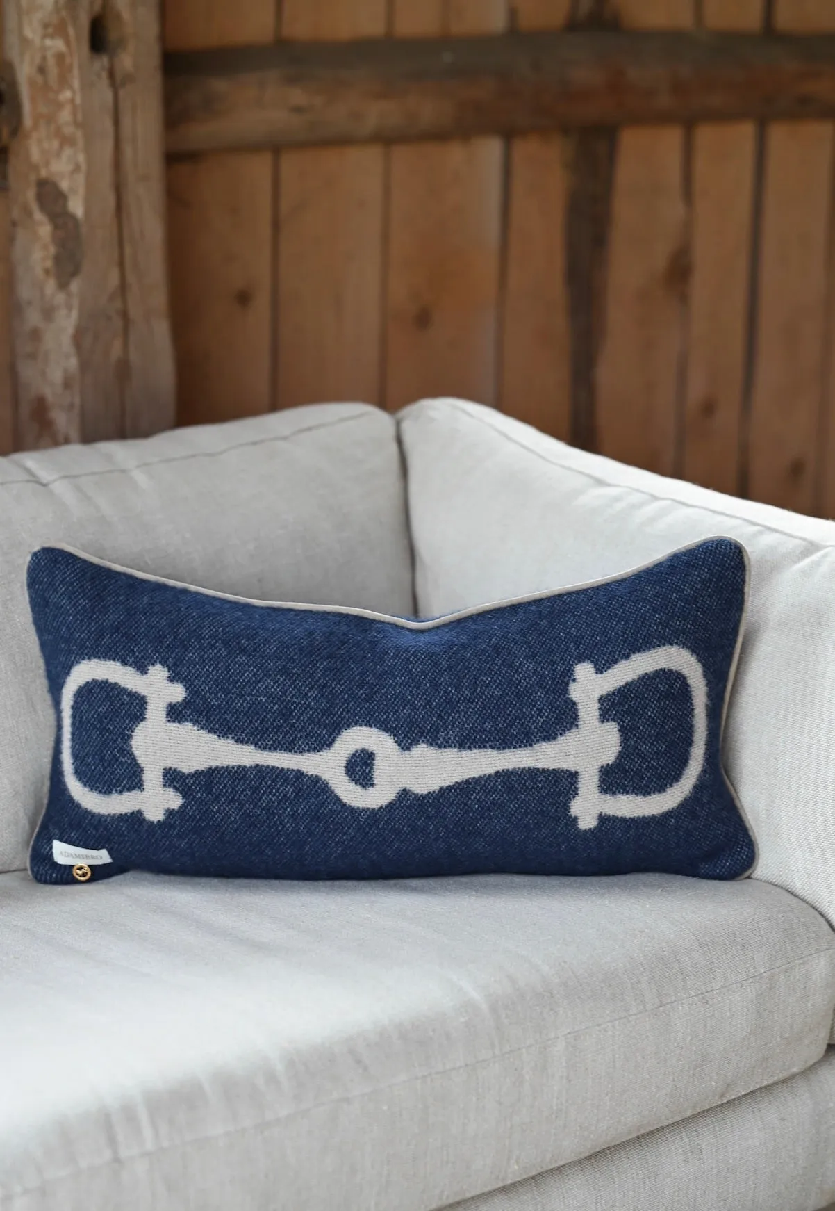 NAVY RETRO CUSHION NZ WOOL 55X25 CM.